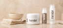 hmbl rich cream, pigment corrector and light moisturizer bottle on a marble counter