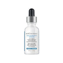 SkinCeuticals Discoloration Defense serum bottle on a white background