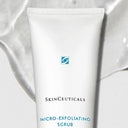 SkinCeuticals micro-exfoliating scrub tube with visible brand logo on a white background