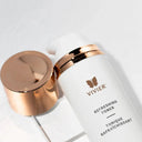 Vivier refreshing toner bottle with rose gold cap on a light background